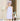 Absorbent bamboo fiber bathroom skirt and shower cap in pale purple, worn by a person, with floral embroidery on the skirt.