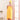 High quality yellow bamboo fiber hair dryer cap and bath robe set worn by a person.